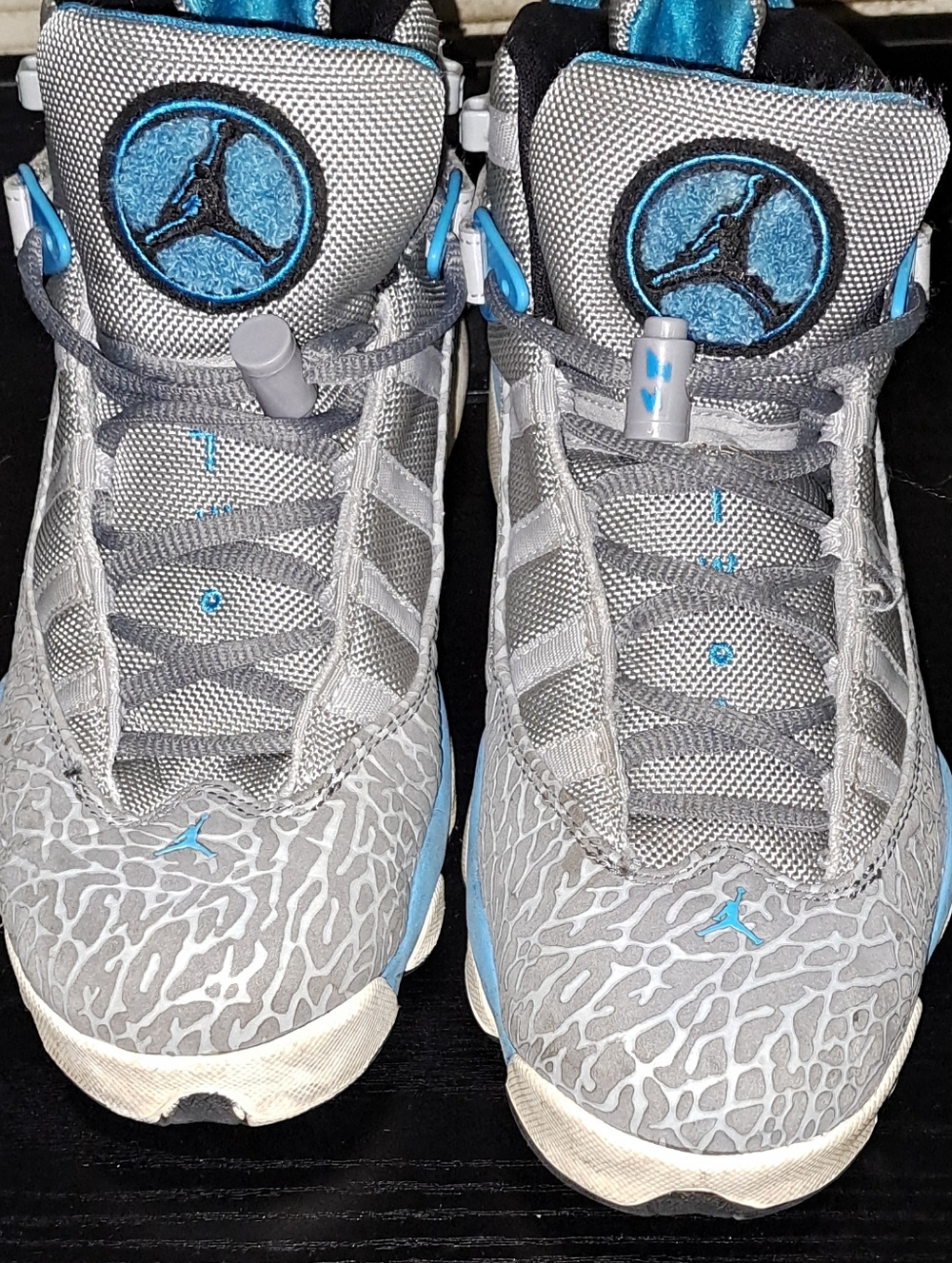 Jordan Grey Sneakers with Blue Jumpman Accents